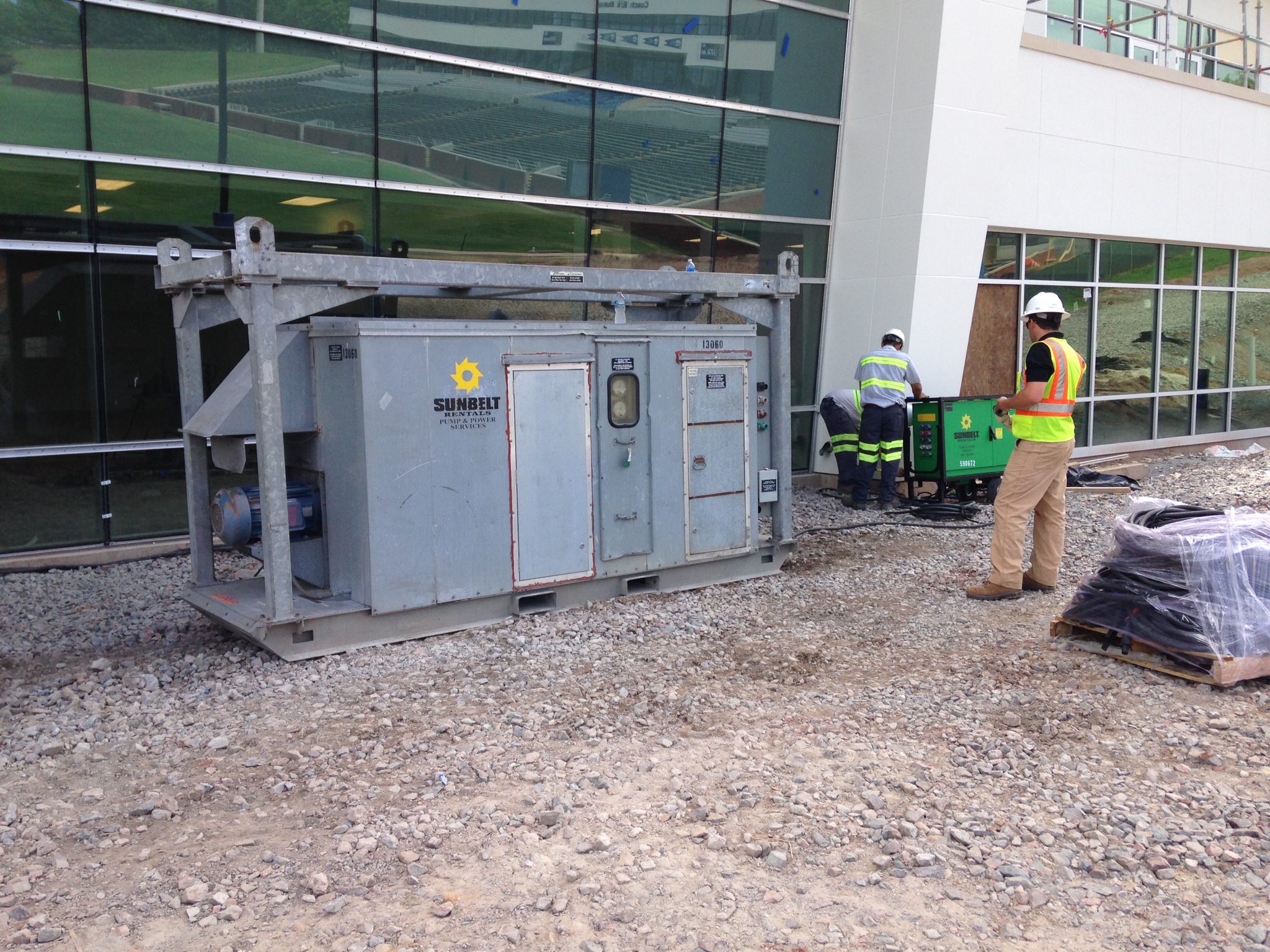 A desiccant dehumidifier from Sunbelt Rentals at a job site.