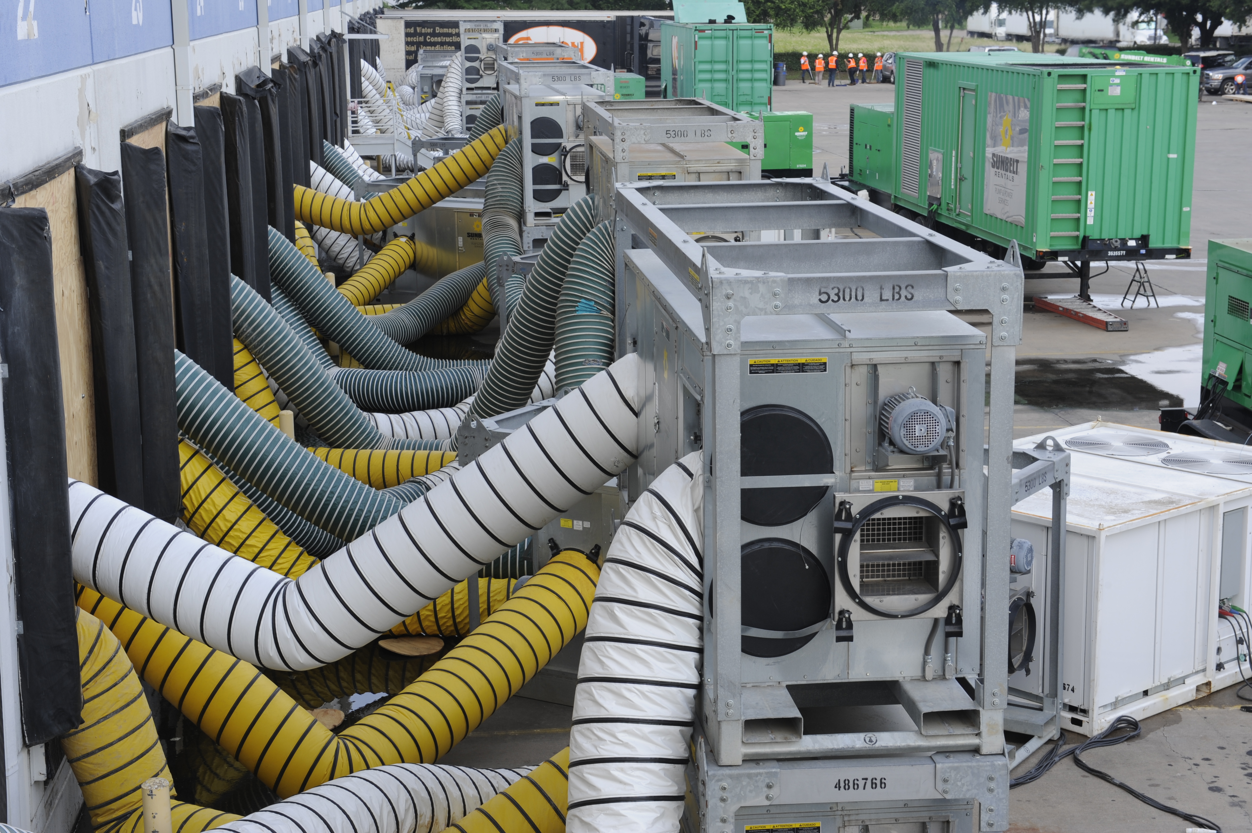 Dehumidifiers installed outside of a building.