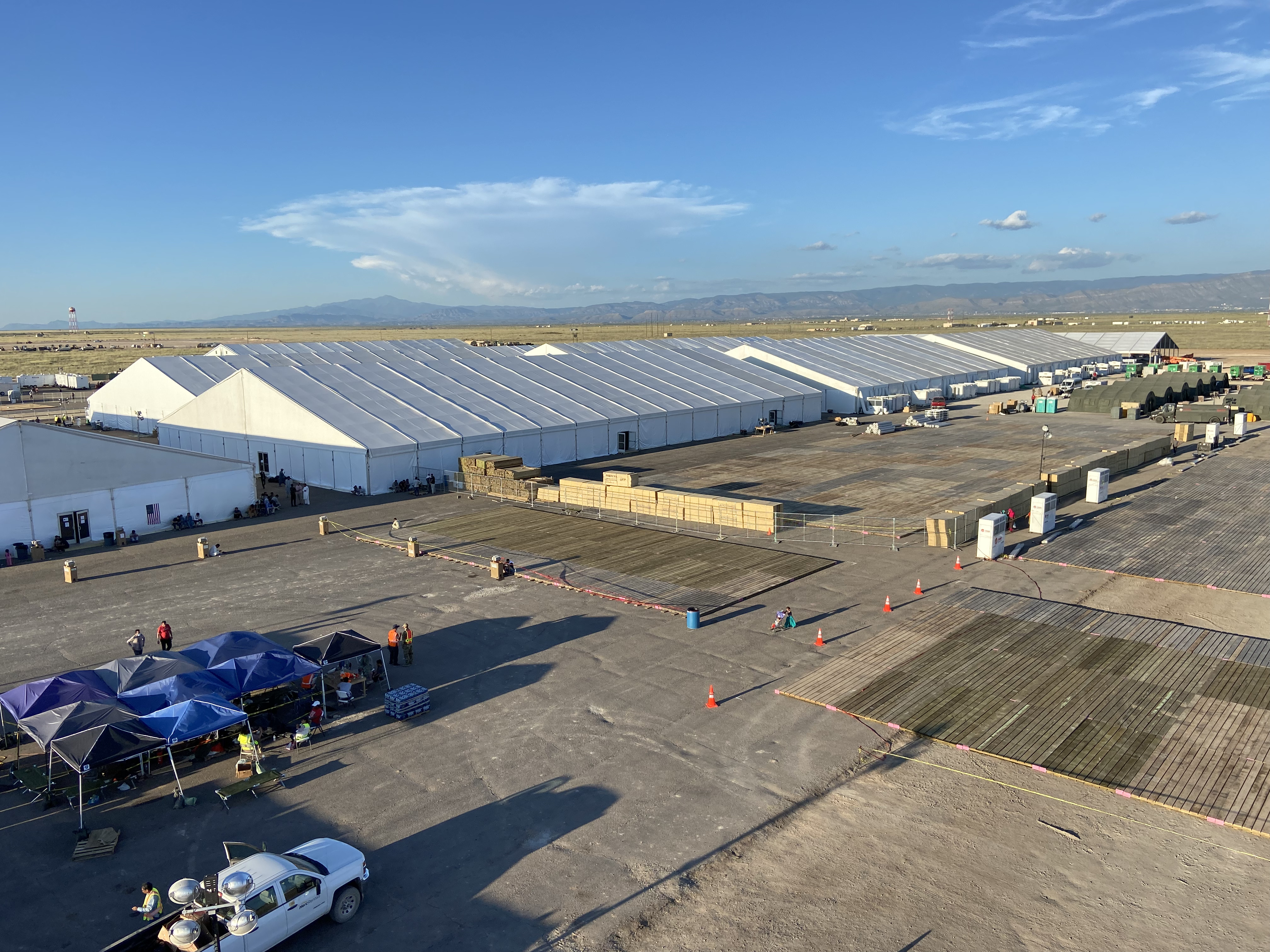 Tension fabric strucutres at an expansive plot of land.