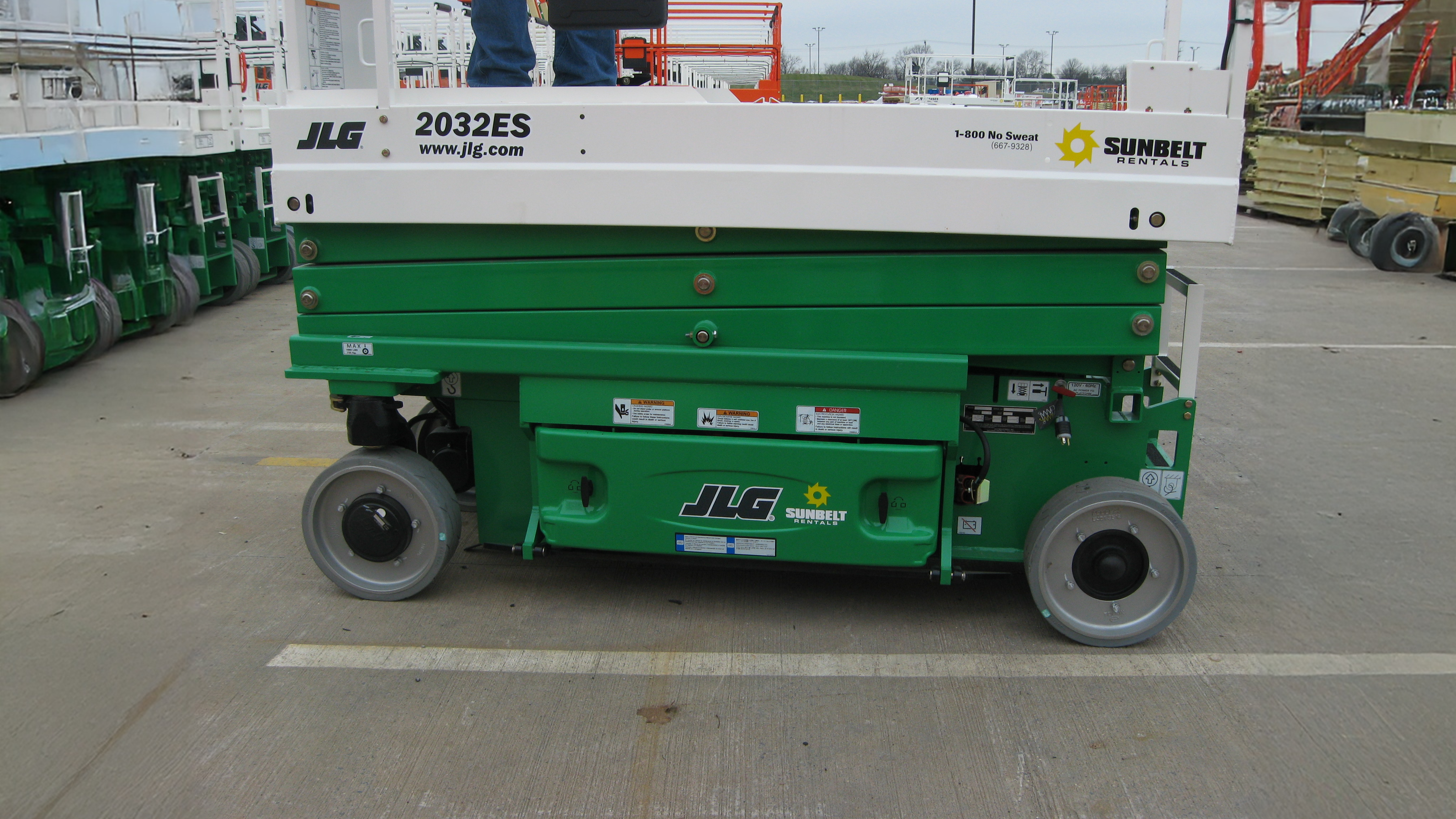 A collapsed scissor lift from Sunbelt Rentals.